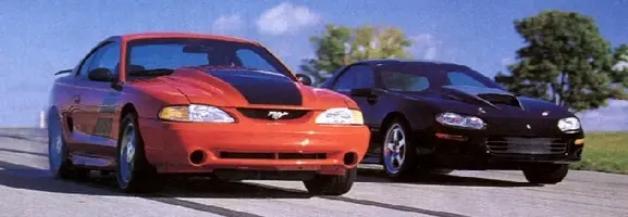 Ford_Mustang_Boss-Chevrolet_Camaro.webp
