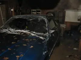 car in garage 1.webp