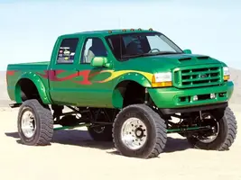 0203or_03zoom+2001_Ford_F250_Super_Duty_4x4+Front_Passenger_Side_In_Motion.webp