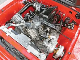 mmfp_0811_08_z+1988_ford_mustang_coupri+engine_bay.webp
