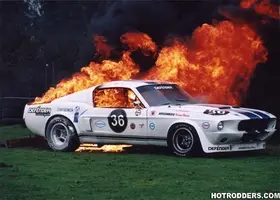 66_mustang_on_fire.webp