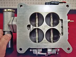 hppp_0704_07_z+fuel_injected_pontiac_455+mass_flo_4_barrel_throttle_body.webp