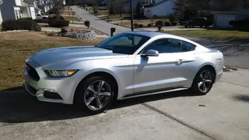 mustang in driveway day1.webp