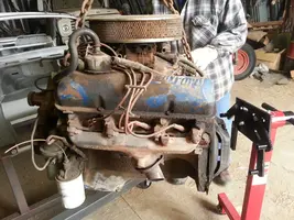 FE 390 Engine on crane.webp