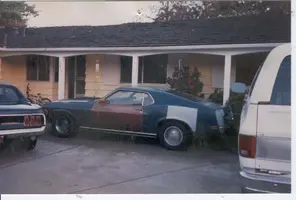 1970 mustang in driveway.webp