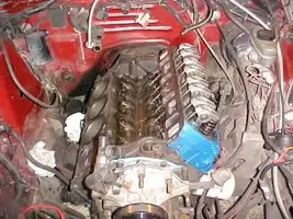 Driverside Push Rod And 1.7 Ratio Roller Rocker.webp