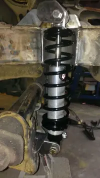 rear coilover in the tunnel.webp
