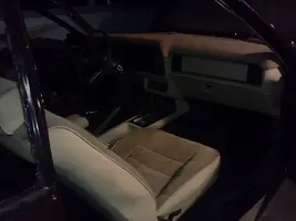 mustang dash and carpet and console and seat.webp