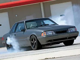 1306-1989-ford-mustang-5-0-lx-front-side-view.webp