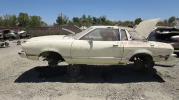 17-1977-ford-mustang-ghia-in-california-junkyard-photo-by-mu-1-640x360.webp