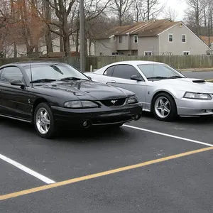Outside a ghetto apartment alongside my former 2002 GT