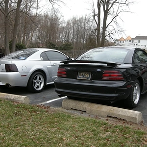 Outside a ghetto apartment alongside my former 2002 GT
