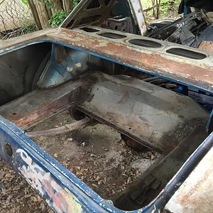 Car was also rear ended and badly repaired (damage not pictured); fuel tank was filled with rust