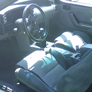 orig. interior, grey w/red piping, as new.