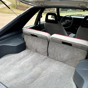 New carpet, seat upholstery, painted release handles